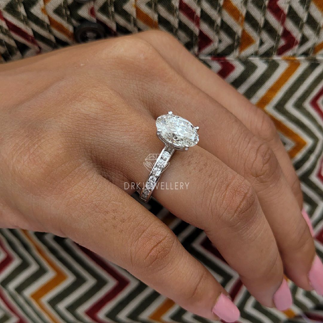 Oval Cut Moissanite Channel Setting Gold Engagement Ring