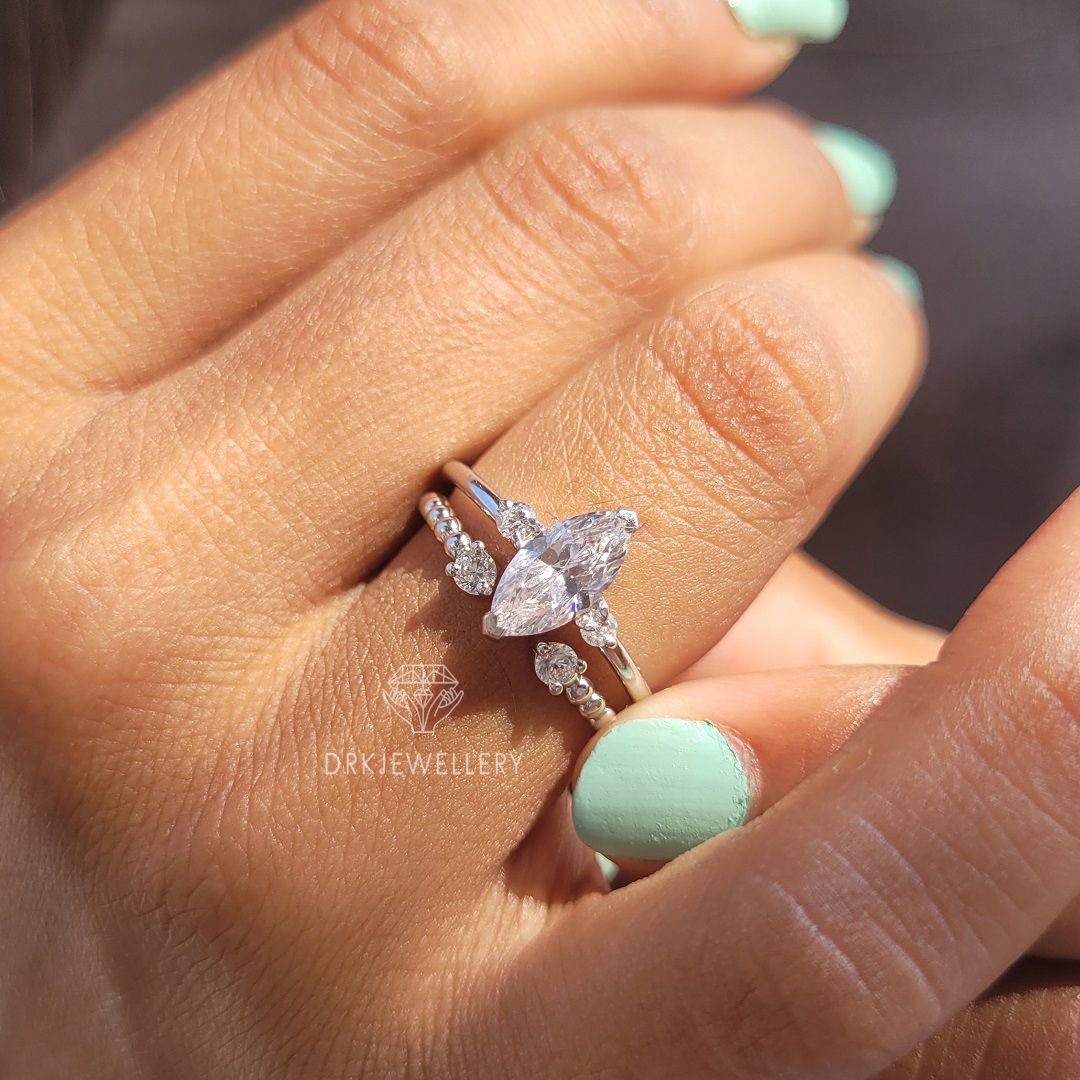 Marquise Cut lab grown diamond three stone style 14k white gold engagement ring