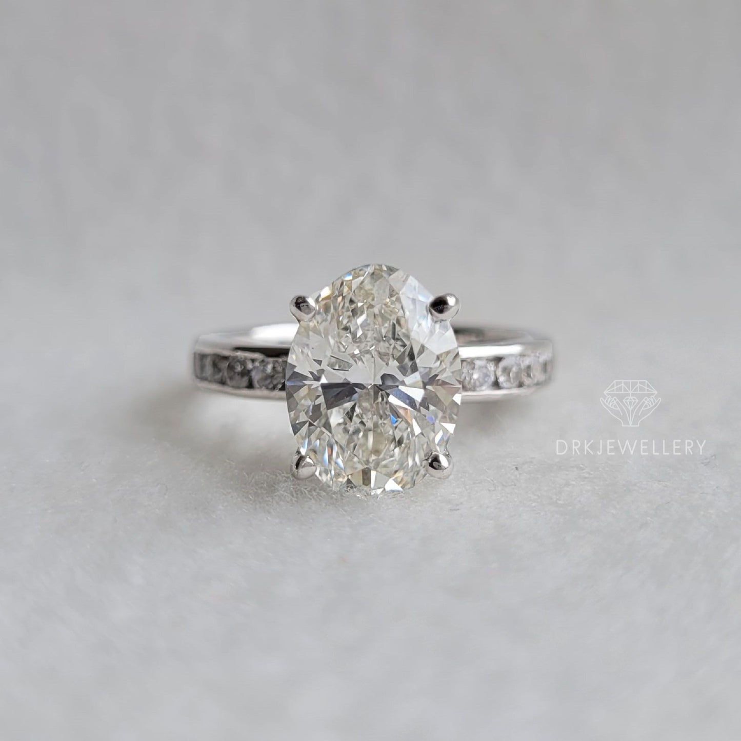 Oval Cut Moissanite Channel Setting Gold Engagement Ring