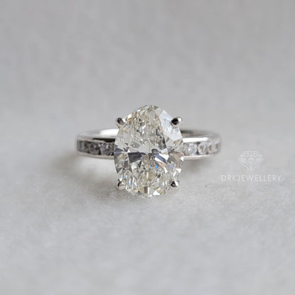 Oval Cut Moissanite Channel Setting Gold Engagement Ring