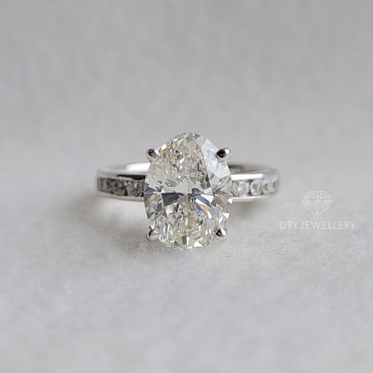 Oval Cut Moissanite Channel Setting Gold Engagement Ring
