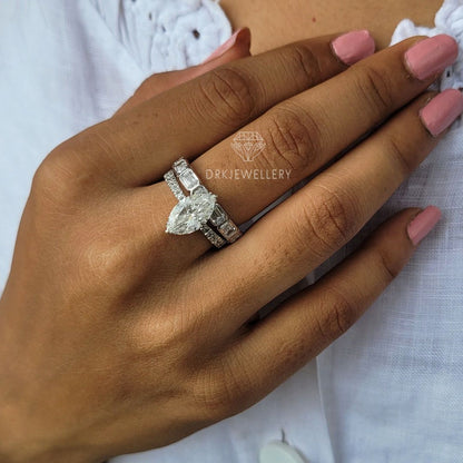 Marquise Cut Moisanite Hidden Halo Ring With East West Emerald Cut Band