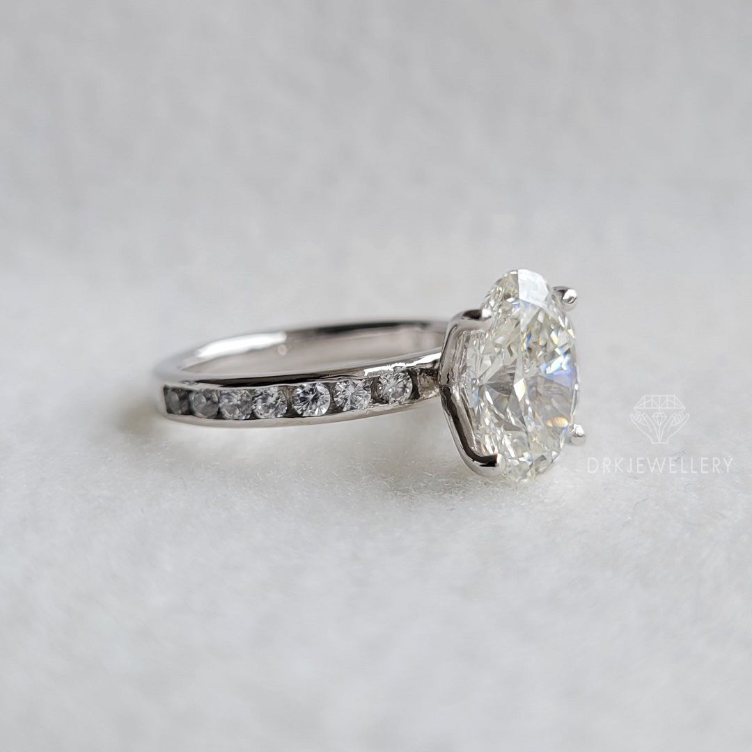 Oval Cut Moissanite Channel Setting Gold Engagement Ring