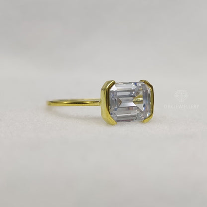 East West Emerald Cut Moissanite Half Bezel Set Gold RIng