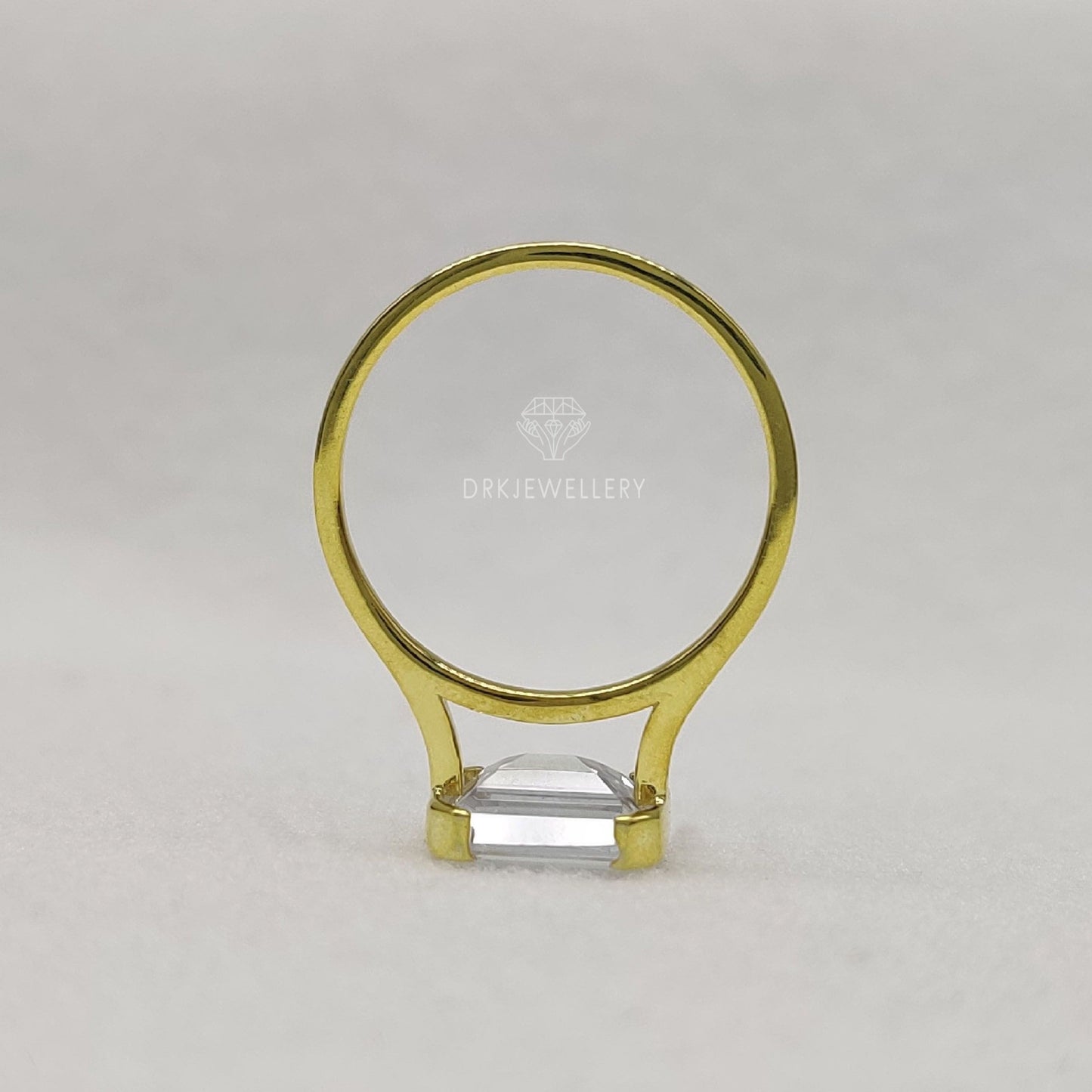 East West Emerald Cut Moissanite Half Bezel Set Gold RIng