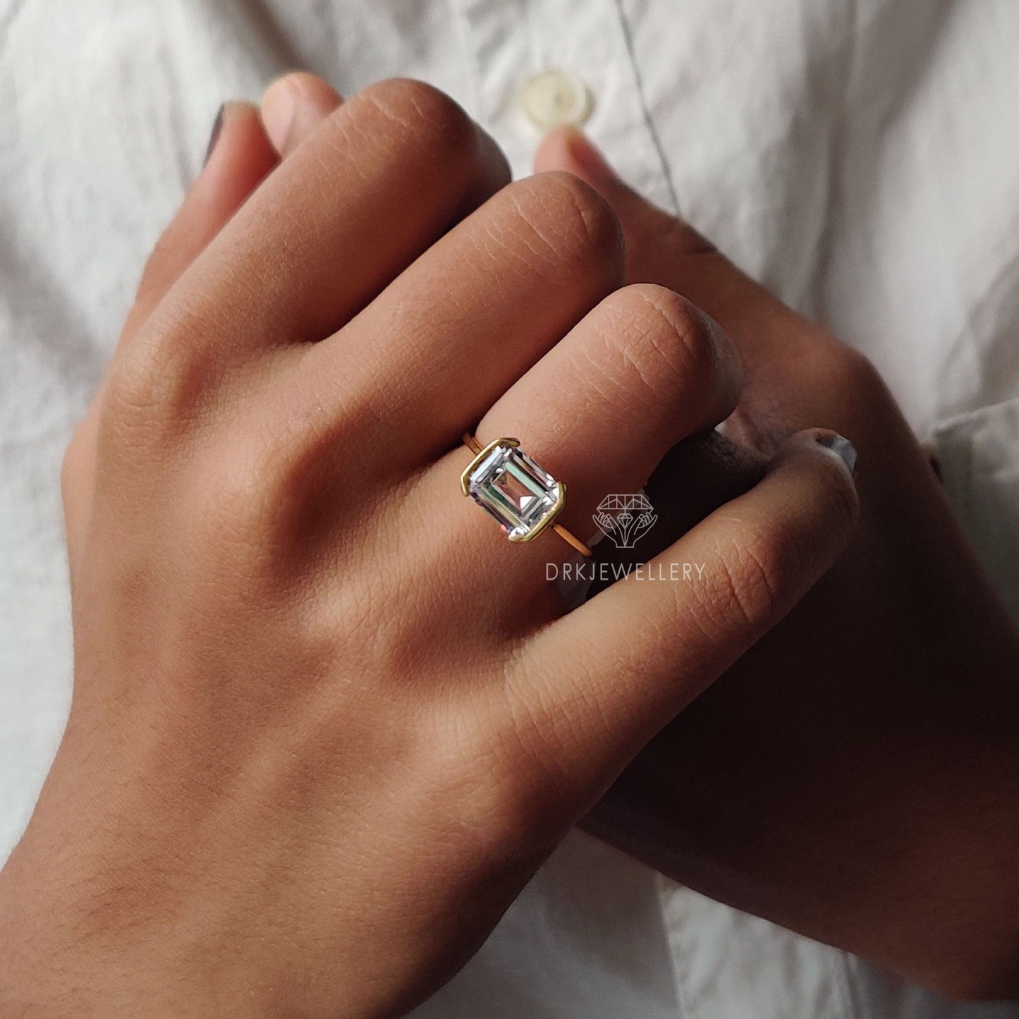 East West Emerald Cut Moissanite Half Bezel Set Gold RIng
