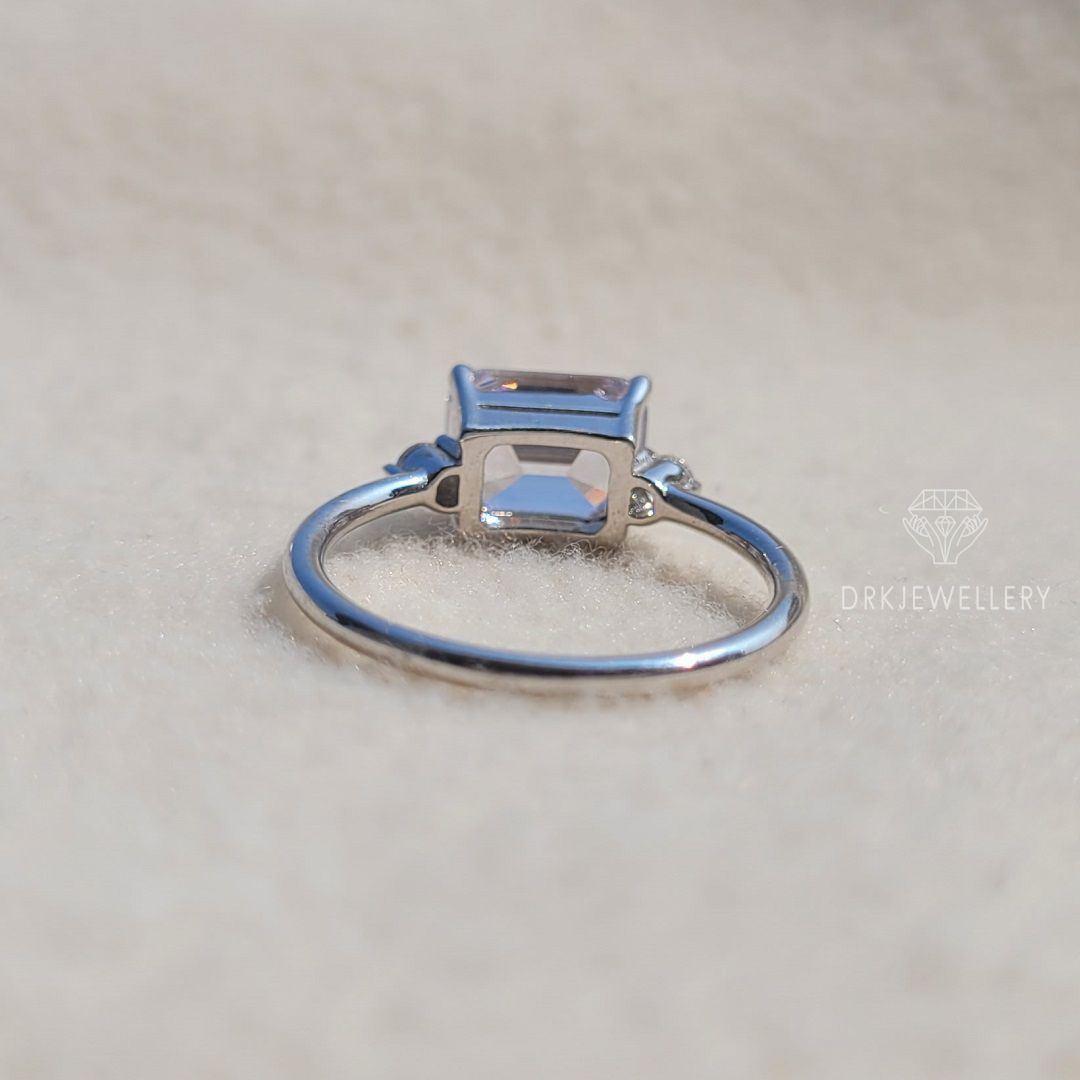 east west emerald cut lab grown diamond ring-emerald  cut ring-modern east west setting-three stone style ring-white gold ring-solitaire ring-moissanite ring-diamond ring