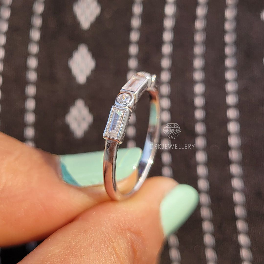 bezel set east west baguette cut lab grown diamond half eternity white gold ring