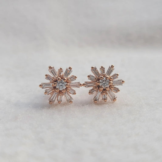 Rose gold starburst earrings with lab grown diamond