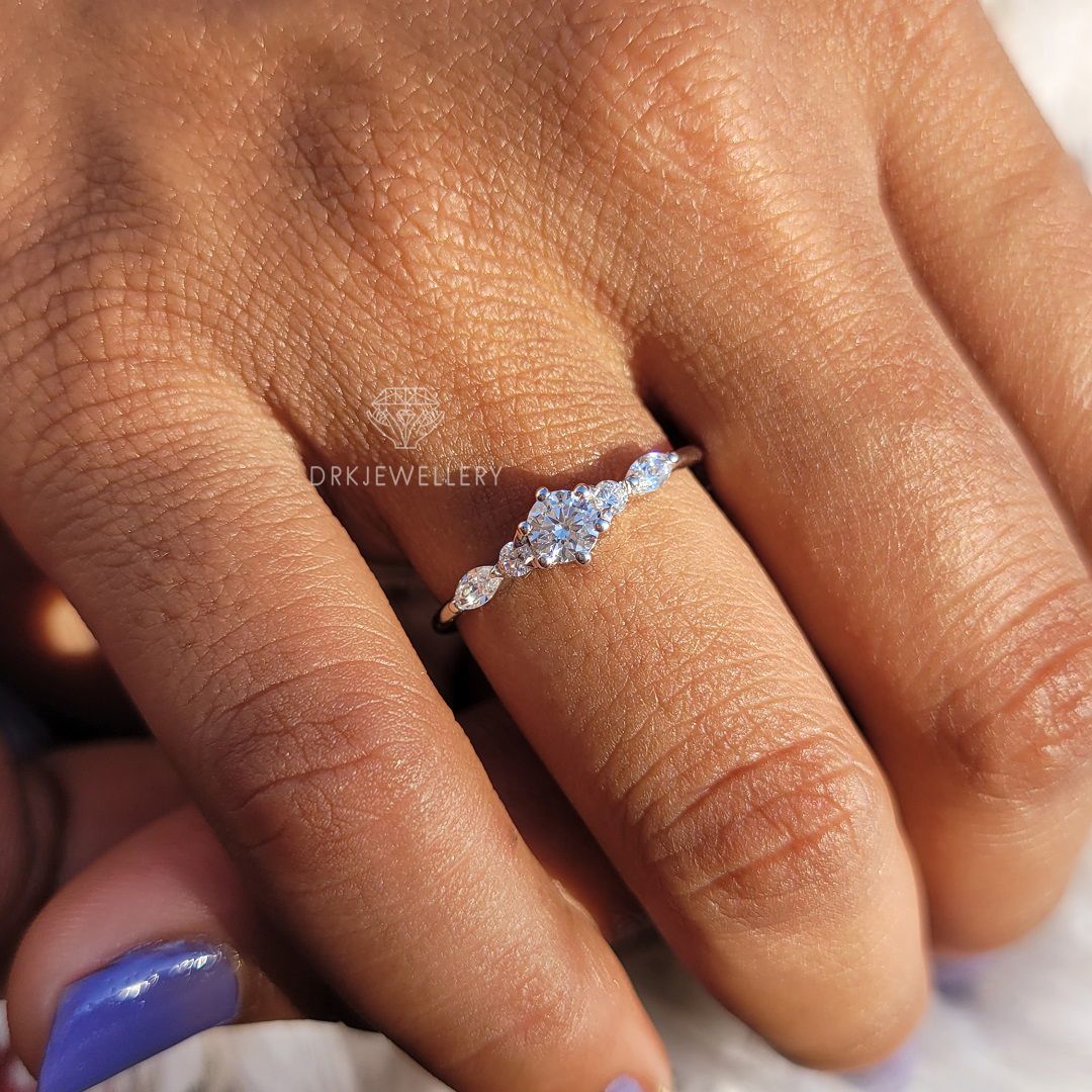 Round cut lab grown diamond pave set engagement ring