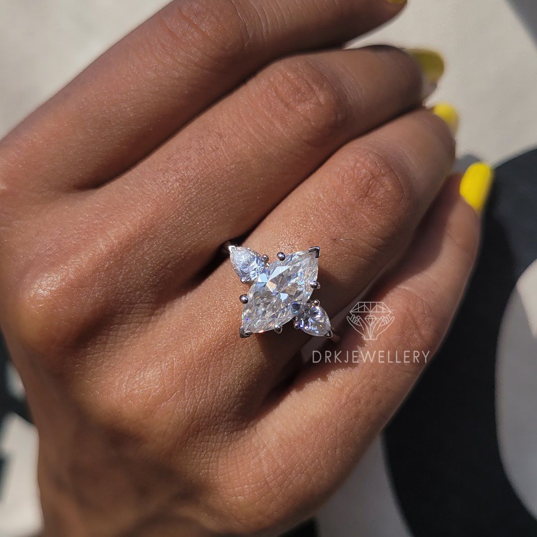 Marquise-Cut-Moissanite-with-Side-Pear-Stone-Ring