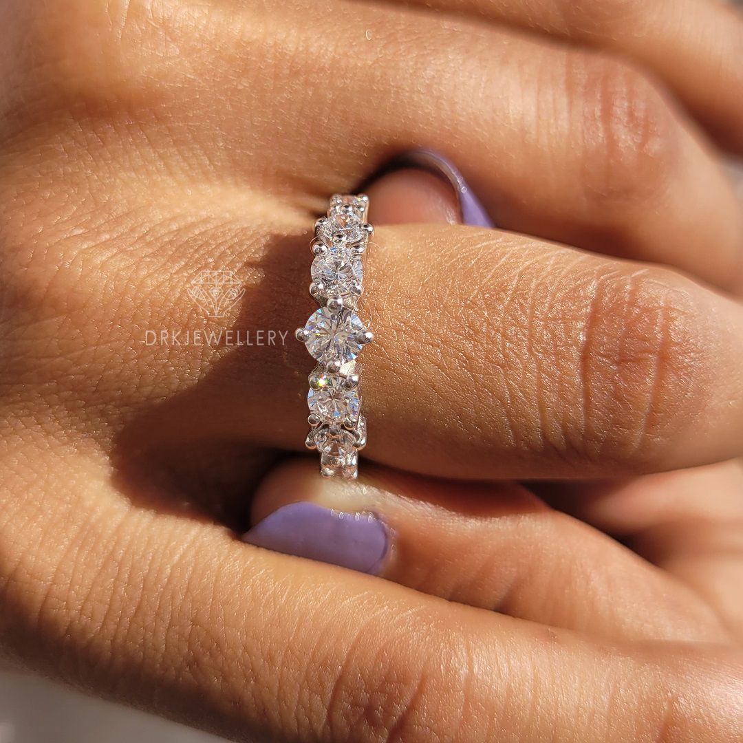 Round cut multisized moissaniite diamond engagement ring with multi in bands in 14k white gold