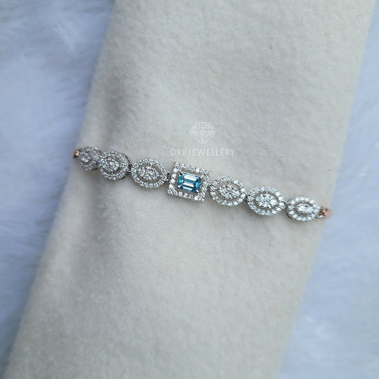 Emerald cut blue lab grown dimaond halo style bracelet for her as a gifts