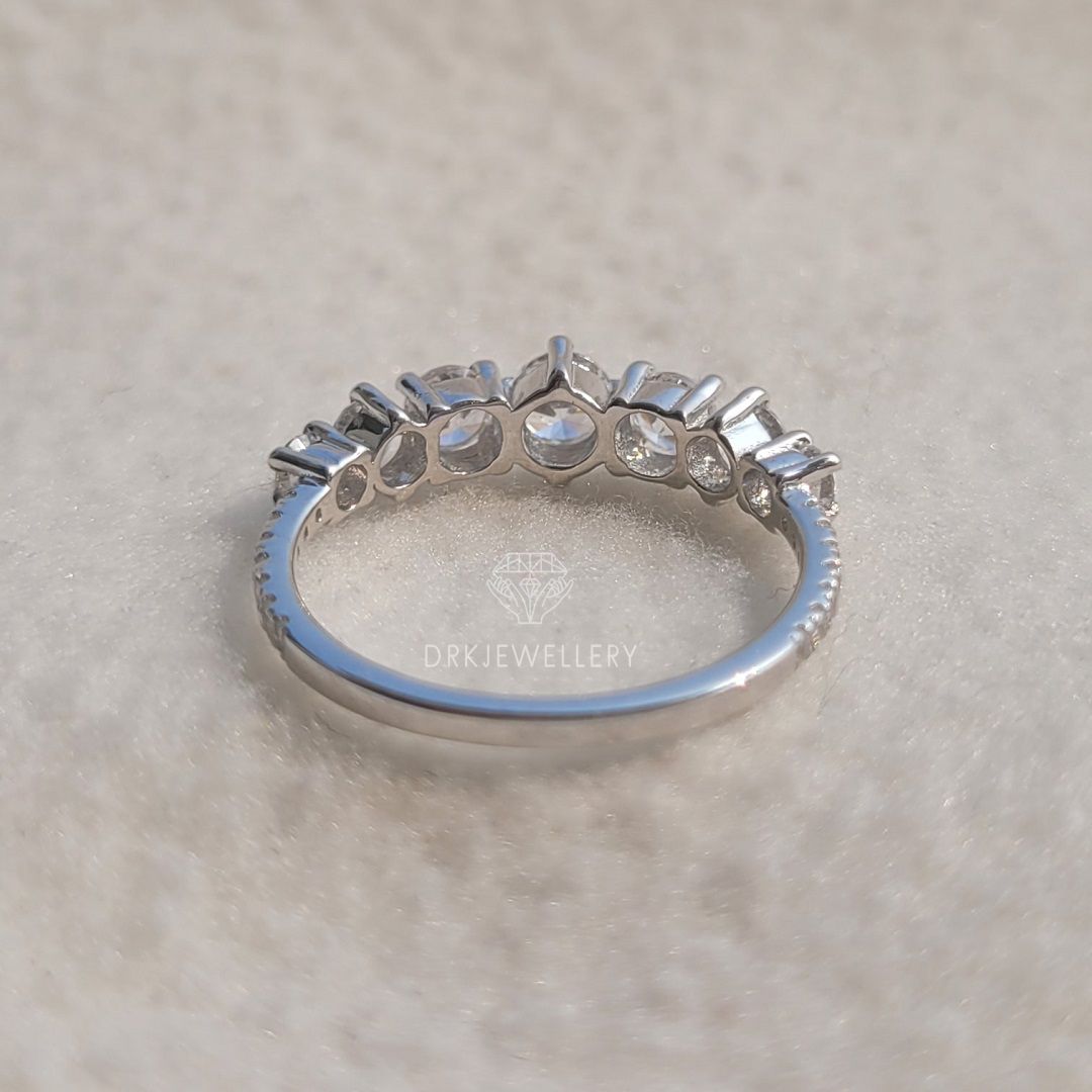 round cut moissanite diamond pave set ring in 14k white gold