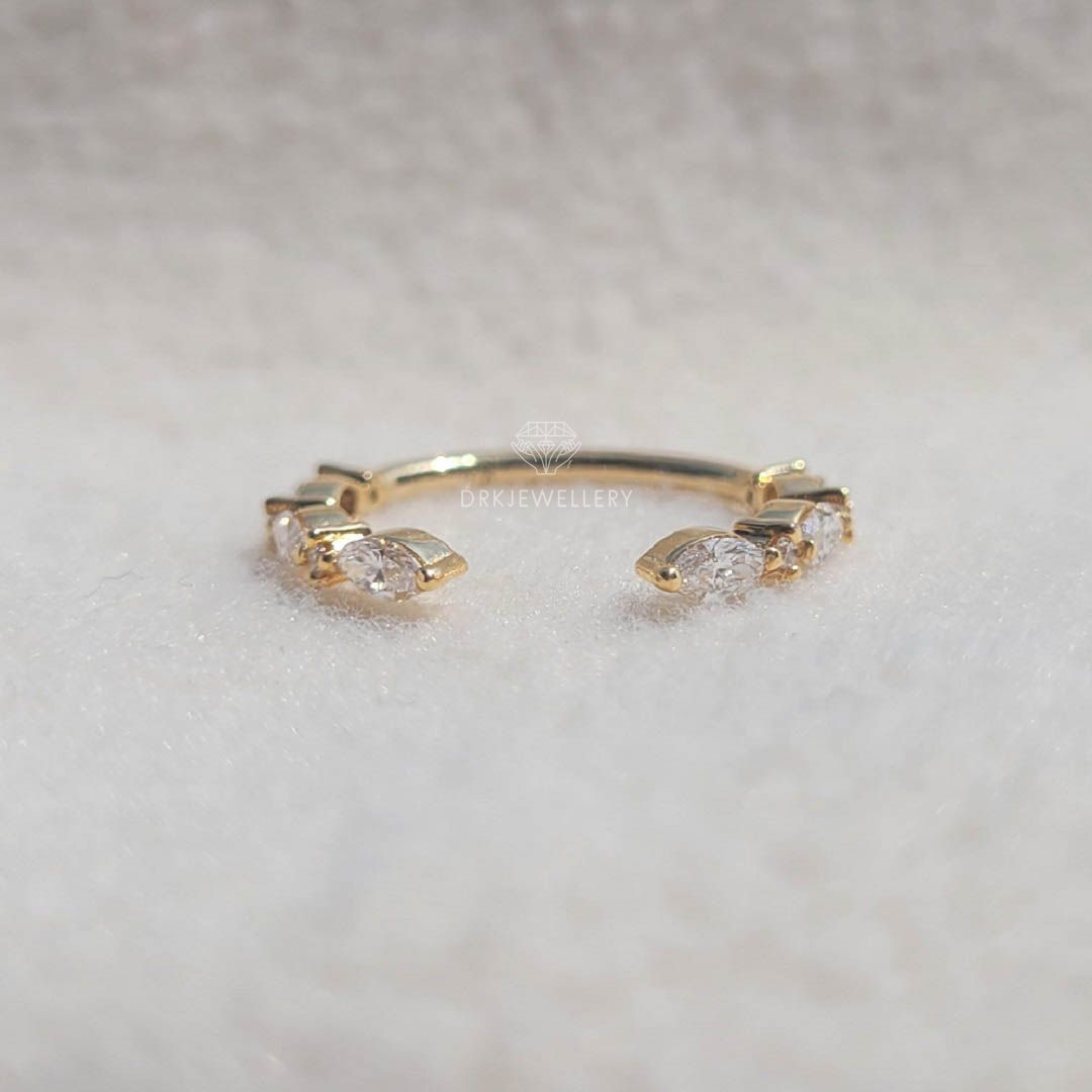 east west marquise cut half eternity open gap matching wedding band in 14k yellow gold