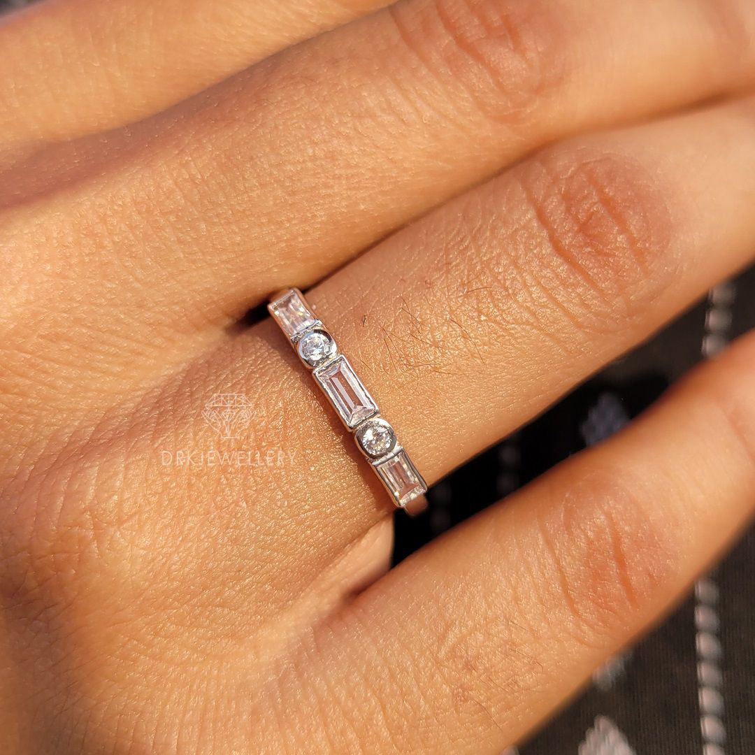 bezel set east west baguette cut lab grown diamond half eternity white gold ring