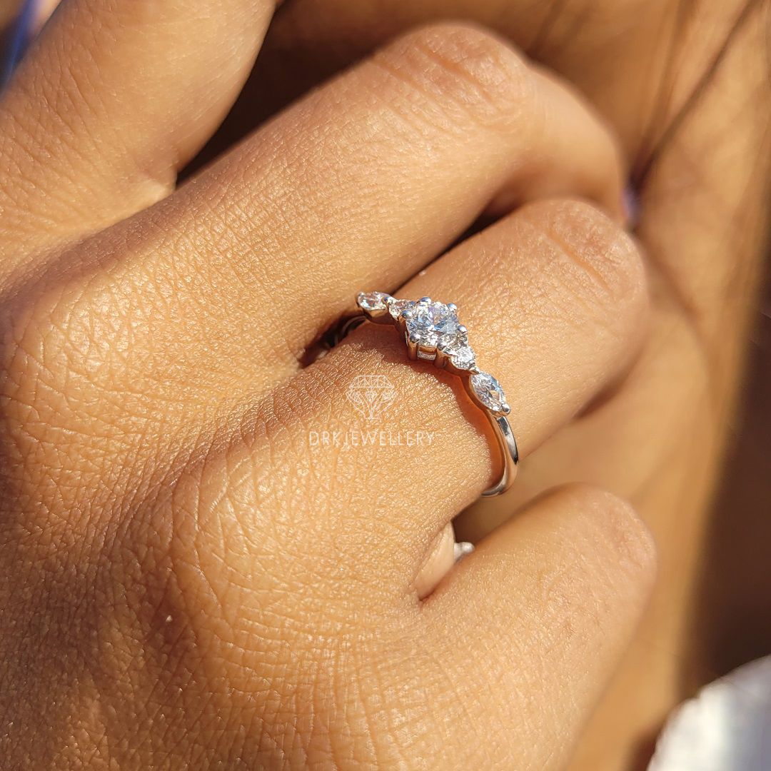 Round cut lab grown diamond pave set engagement ring