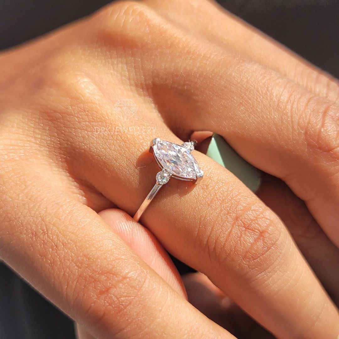 Marquise Cut lab grown diamond three stone style 14k white gold engagement ring
