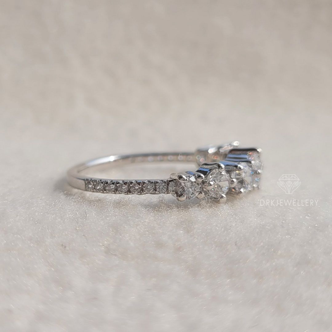 round cut moissanite diamond pave set ring in 14k white gold