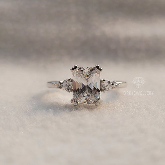 emerald criss cut lab grown diamond three stone style pave setting 14k gold engagement ring