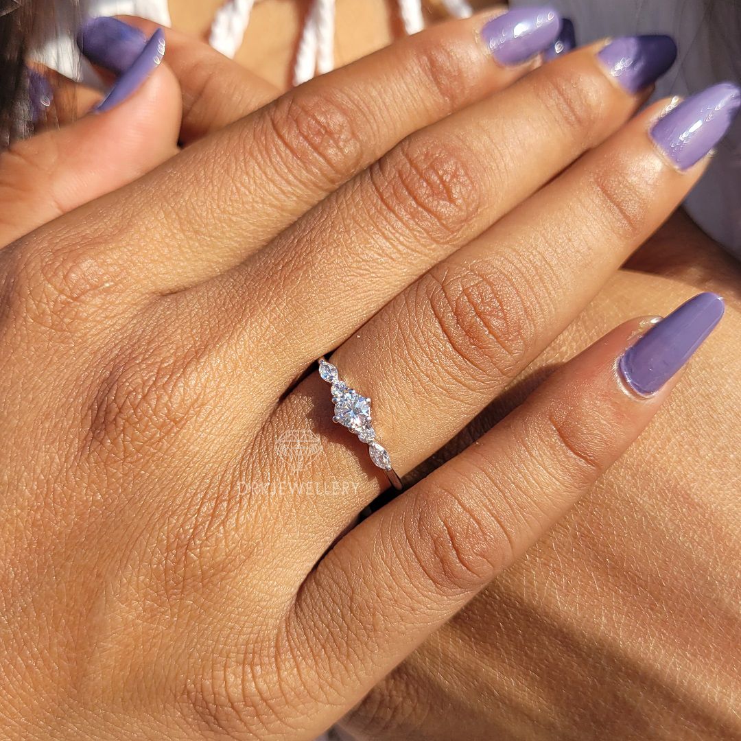 Round cut lab grown diamond pave set engagement ring