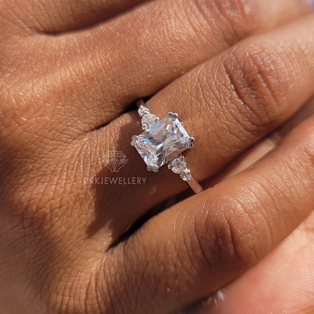 emerald criss cut lab grown diamond three stone style pave setting 14k gold engagement ring