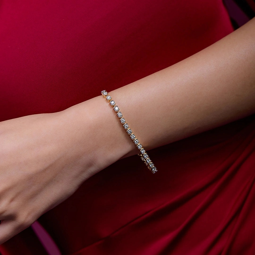 half bezel set diamond bracelet, round cut lab grown diamond bracelet, gold bracelet, chain bracelet, clip closure bracelet, milgrain set bracelet