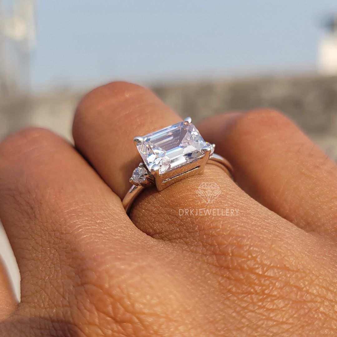 east west emerald cut lab grown diamond ring-emerald  cut ring-modern east west setting-three stone style ring-white gold ring-solitaire ring-moissanite ring-diamond ring
